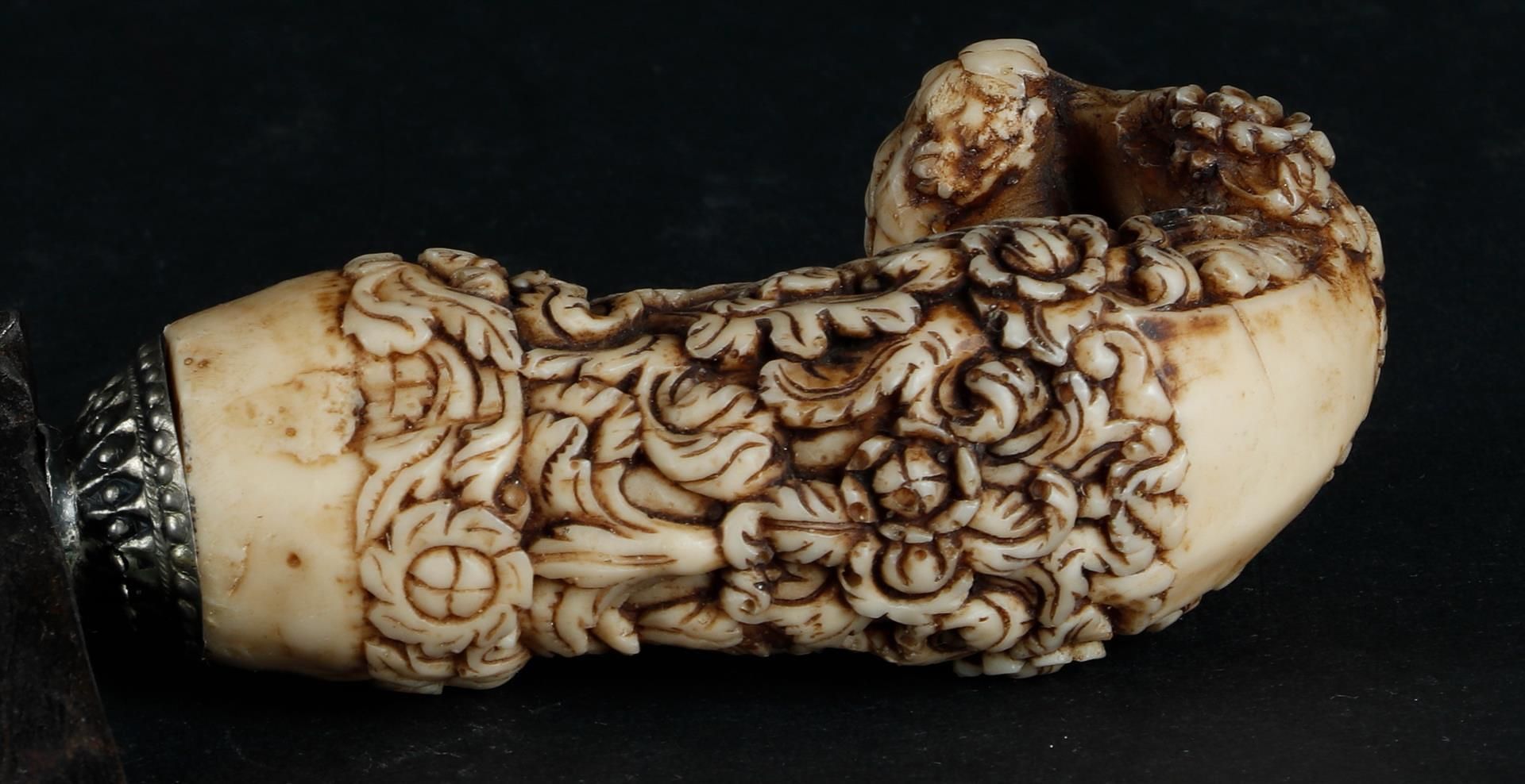 A kris with richly carved bone handle and a straight damask forged blade. Indonesia, 19th century or - Image 3 of 3