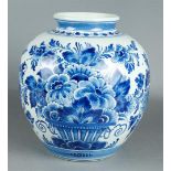 An earthenware ball vase decorated with flowers in a vase, marked Porceleyne Fles. Delft, 20th centu