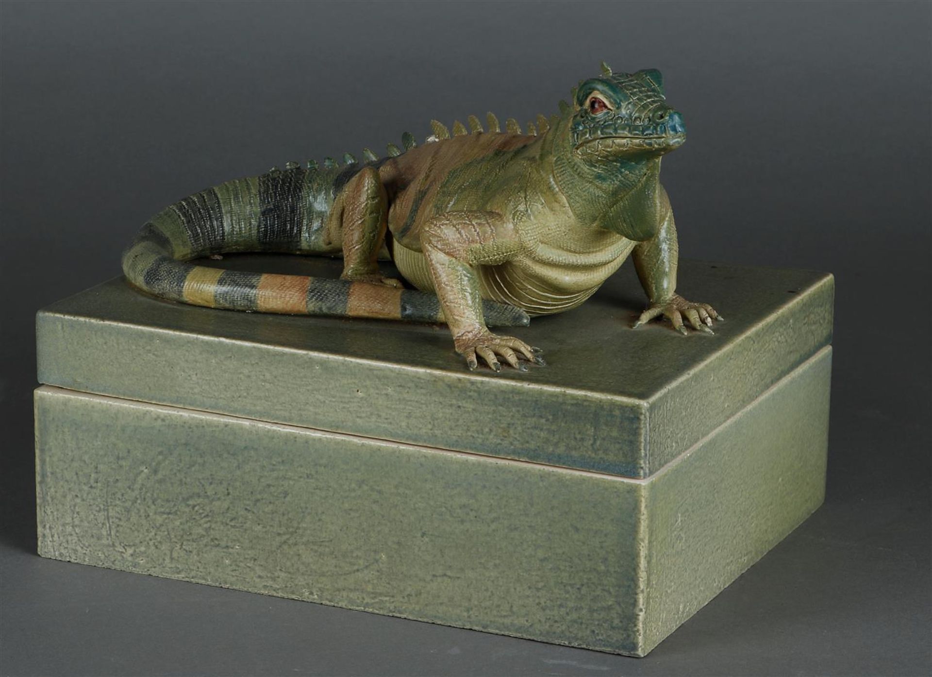 Els van Westerloo (Amsterdam 1945), An iguana on a box. signed and dated "87" on the bottom.