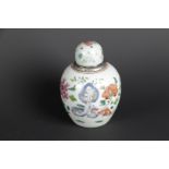 A porcelain Famille Rose tea caddy with a silver-rimmed frame and a convex lid. Chinese, Qianlong.