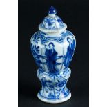 A porcelain lidded jar with a lump in the belly, with long echelons decor and a fool at the bottom,