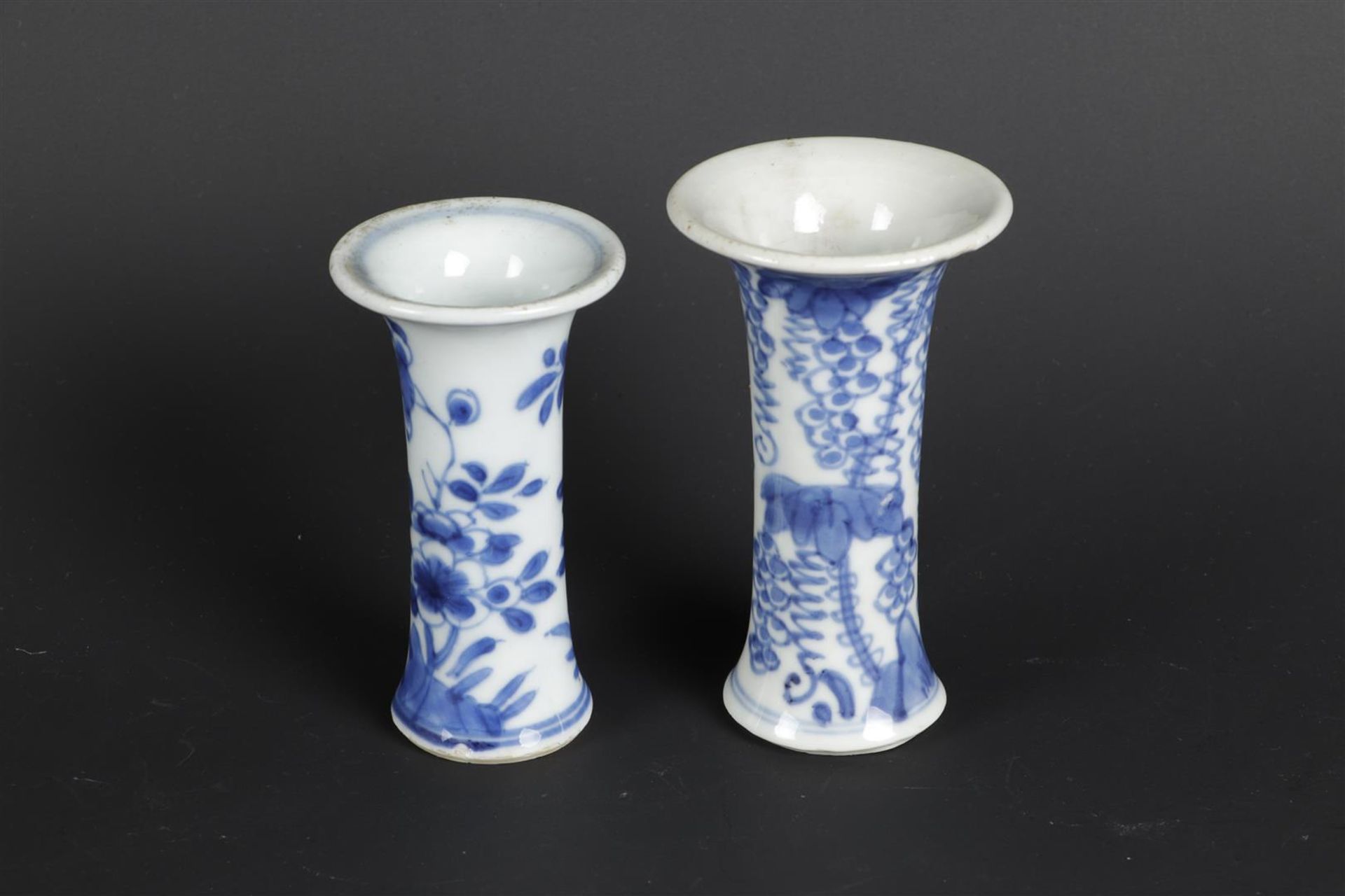 Two porcelain various cup vases, both with floral decoration. China, Kangxi/Yongzheng.