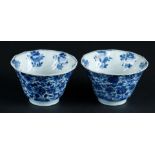 Two porcelain angled bowls with sloping relief decoration with rich flower decoration. Marked with i