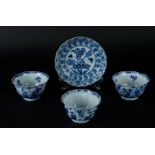 Three porcelain angled bowls and a lobed saucer, all with rich floral decoration. China, Kangxi.