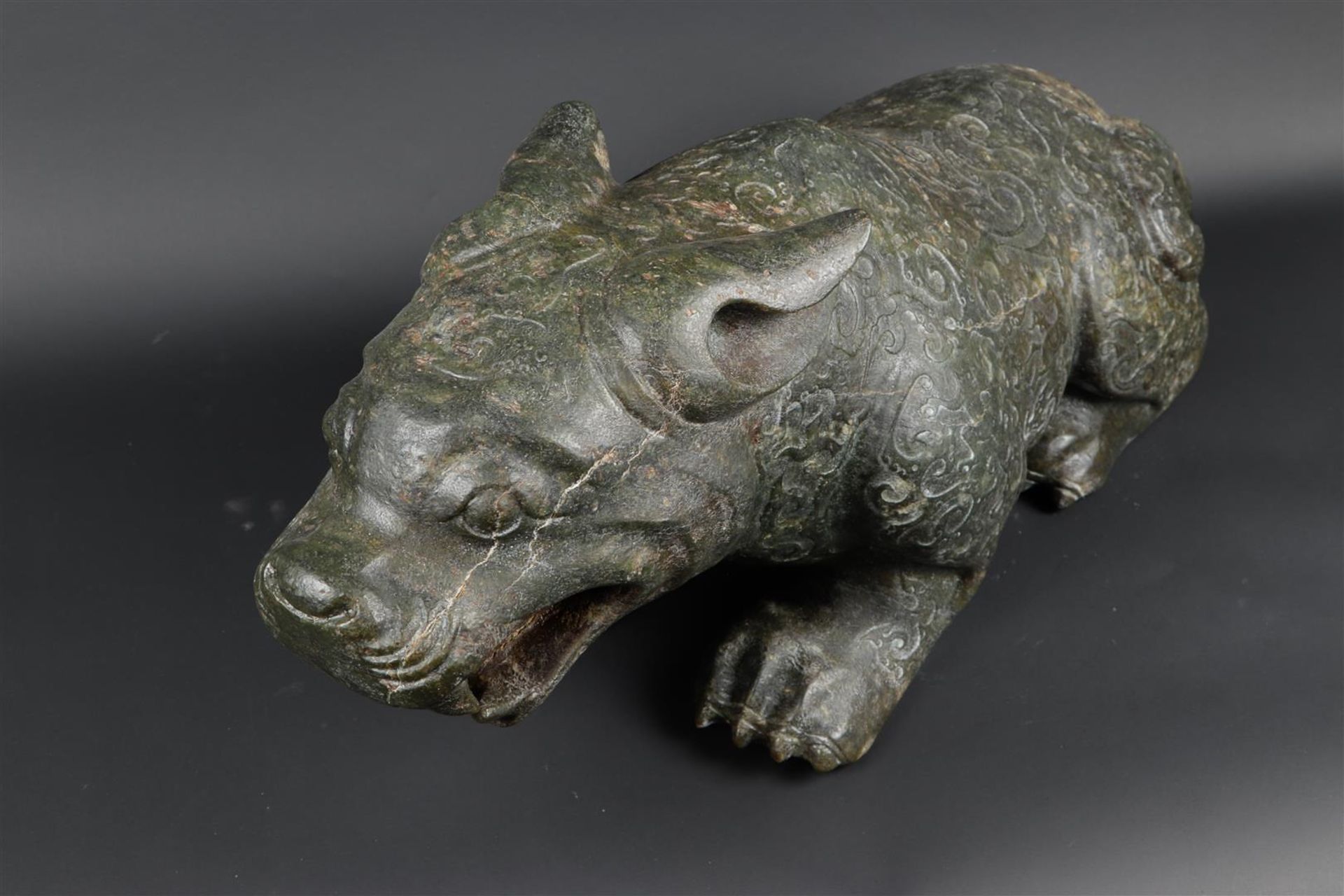 A "Spinach" jade sculpture of a fantasy lion. 20th century. Weight 34.5 kg. - Image 13 of 14