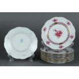 A set of 9 porcelain pie plates with apponyi purple decor. Herend, Hungary.