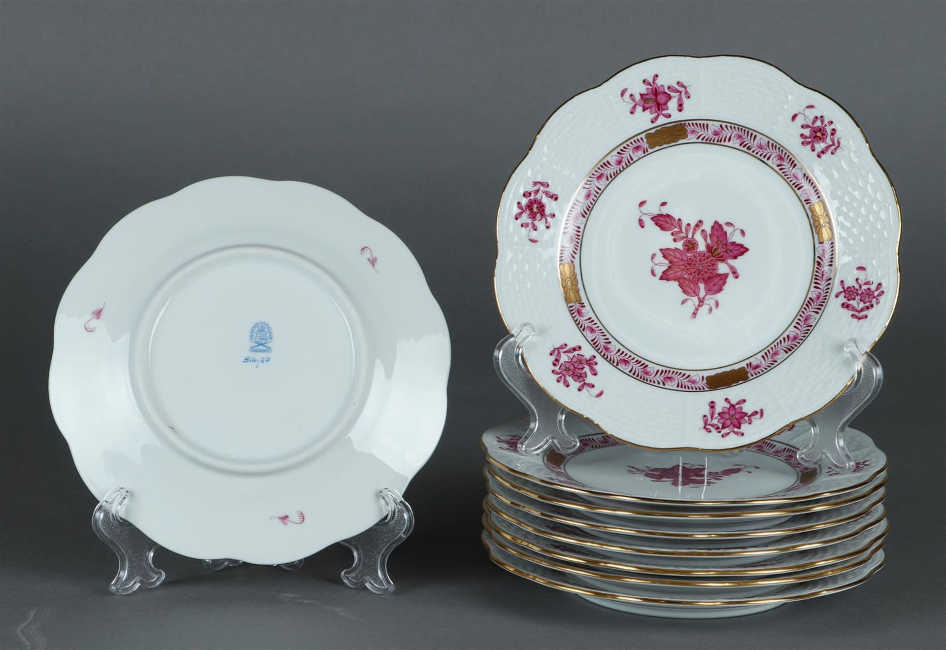 A set of 9 porcelain pie plates with apponyi purple decor. Herend, Hungary.
