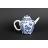 A porcelain angled teapot with floral decor on rock with insects. China, Kangxi.