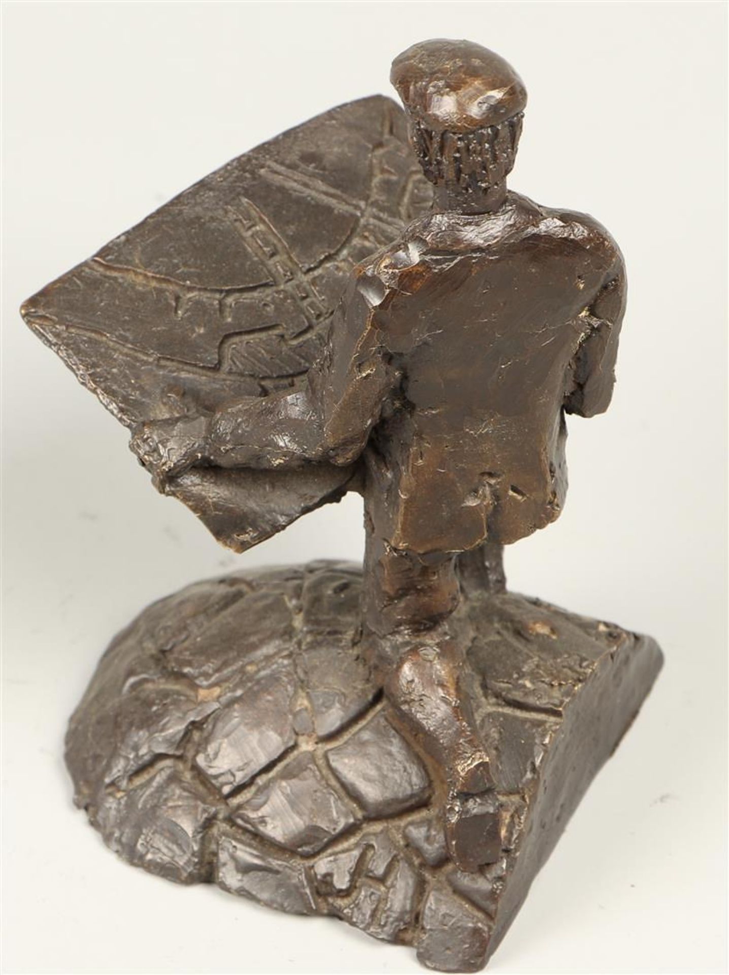 and three decorative bronze statuettes of rockers, two heads, and a dike warden. - Image 7 of 7