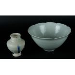 A Celadon bowl with lined decoration and contoured rim and a Celadon vase with line decor. 19th/20th