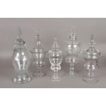 A lot of clear glass including various ginger coupes and vases.