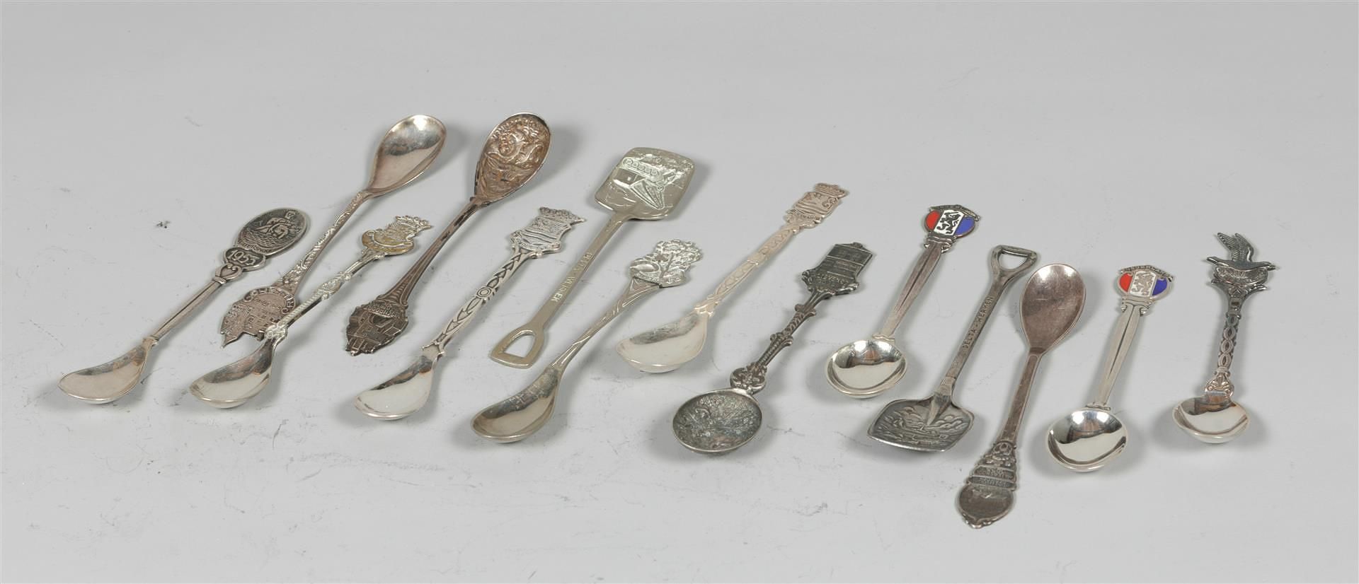 A lot of occasional spoons from various Zeeland cities.