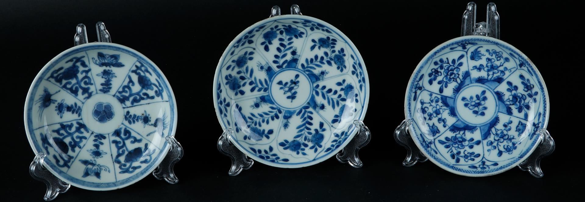 Three various porcelain plates with divisions and with lotus leaf divisions, with floral decoration.