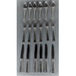 A 6 person silver dinner cutlery set consisting of spoons, knives and forks. 999 silver - M.J. Gerri