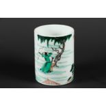 A porcelain brush pot with Famille Verte decor with various playing figures, marked with artemisia l