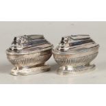 A set of (2) silver plated Ronson, Queen Anne-style table lighters, England, 1960.