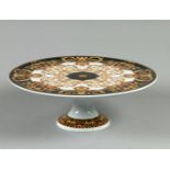 A porcelain cake tray with Baroque decor, Rosenthal for Versace. Germany, late 20th century.