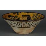 A pottery Nishapur painted bowl. Persia, probably 13th century.
