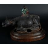 A terracotta incense burner in the shape of an ox with a Chinese boy. China, 19th century.