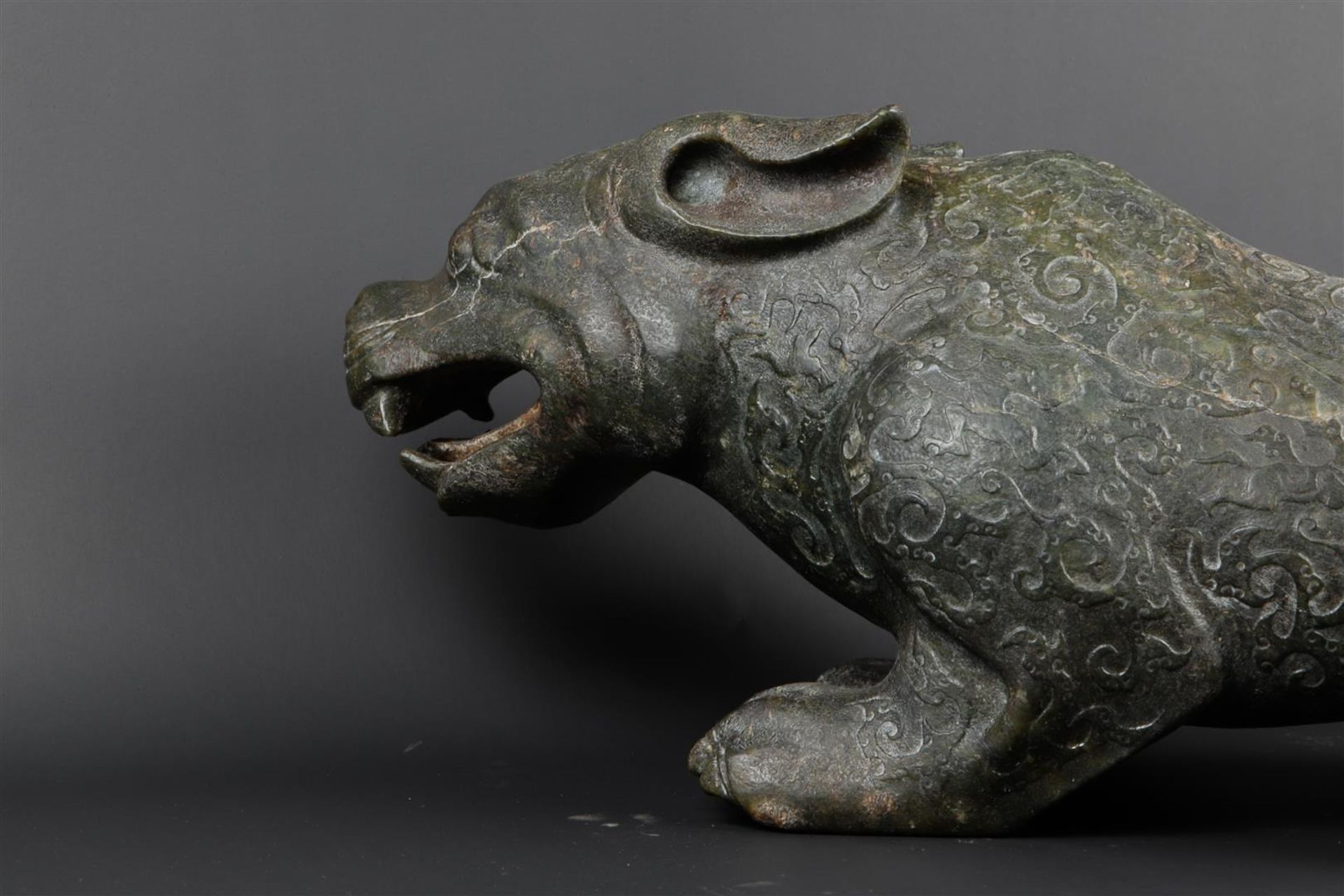 A "Spinach" jade sculpture of a fantasy lion. 20th century. Weight 34.5 kg. - Image 9 of 14