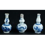 Three porcelain small model knob vases, all with floral decoration. China, Yongzheng.