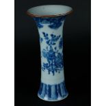 A porcelain beaker vase with floral decor, with vase on garden table decor. China, Qianlong.