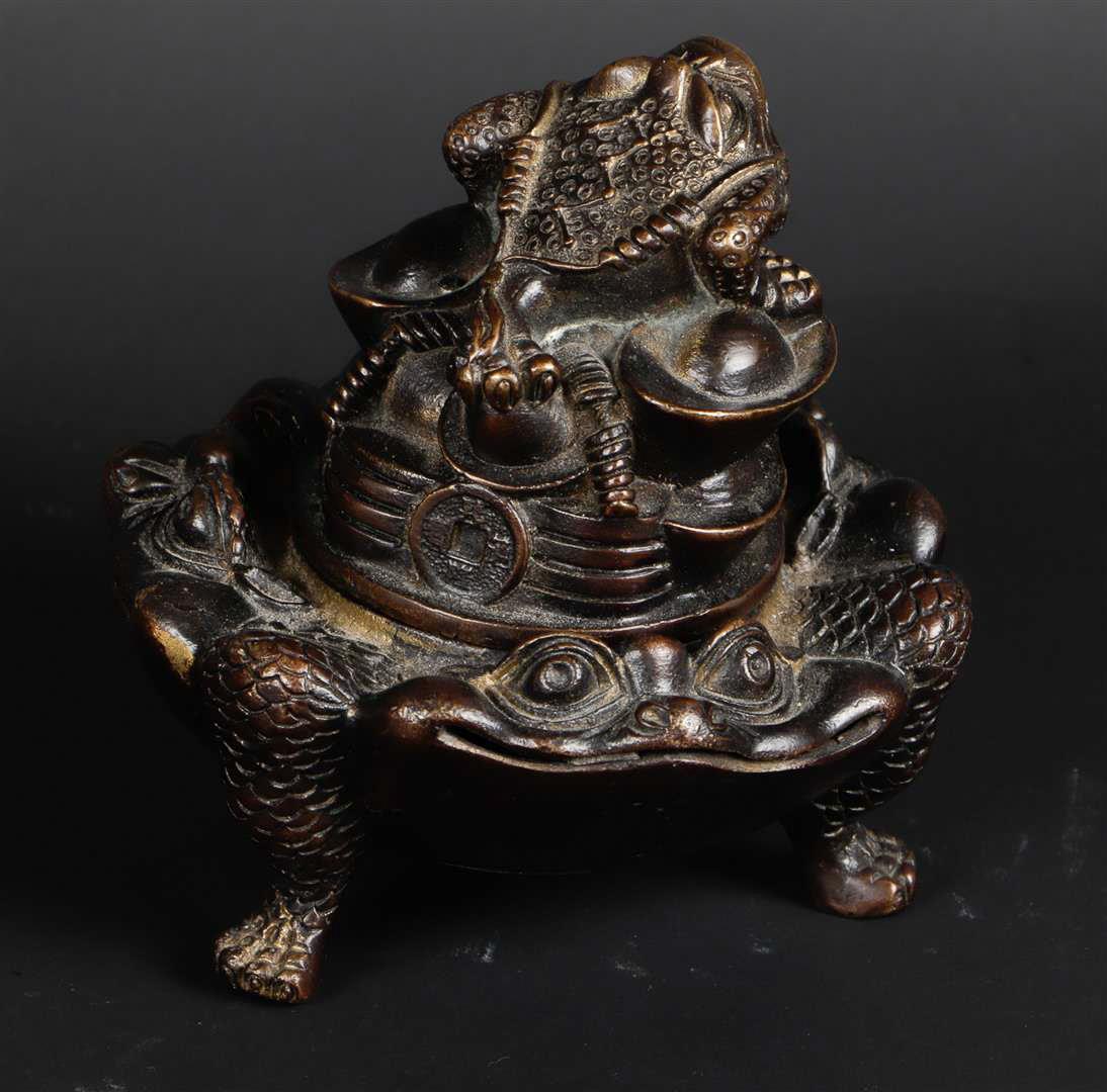 A bronze incense burner decorated with frogs. China, 20th century.
