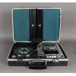 A vintage SANYO record player in case. In working condition.