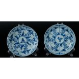 Two porcelain plates with lotus flower divisions, with floral decor. China, Kangxi.