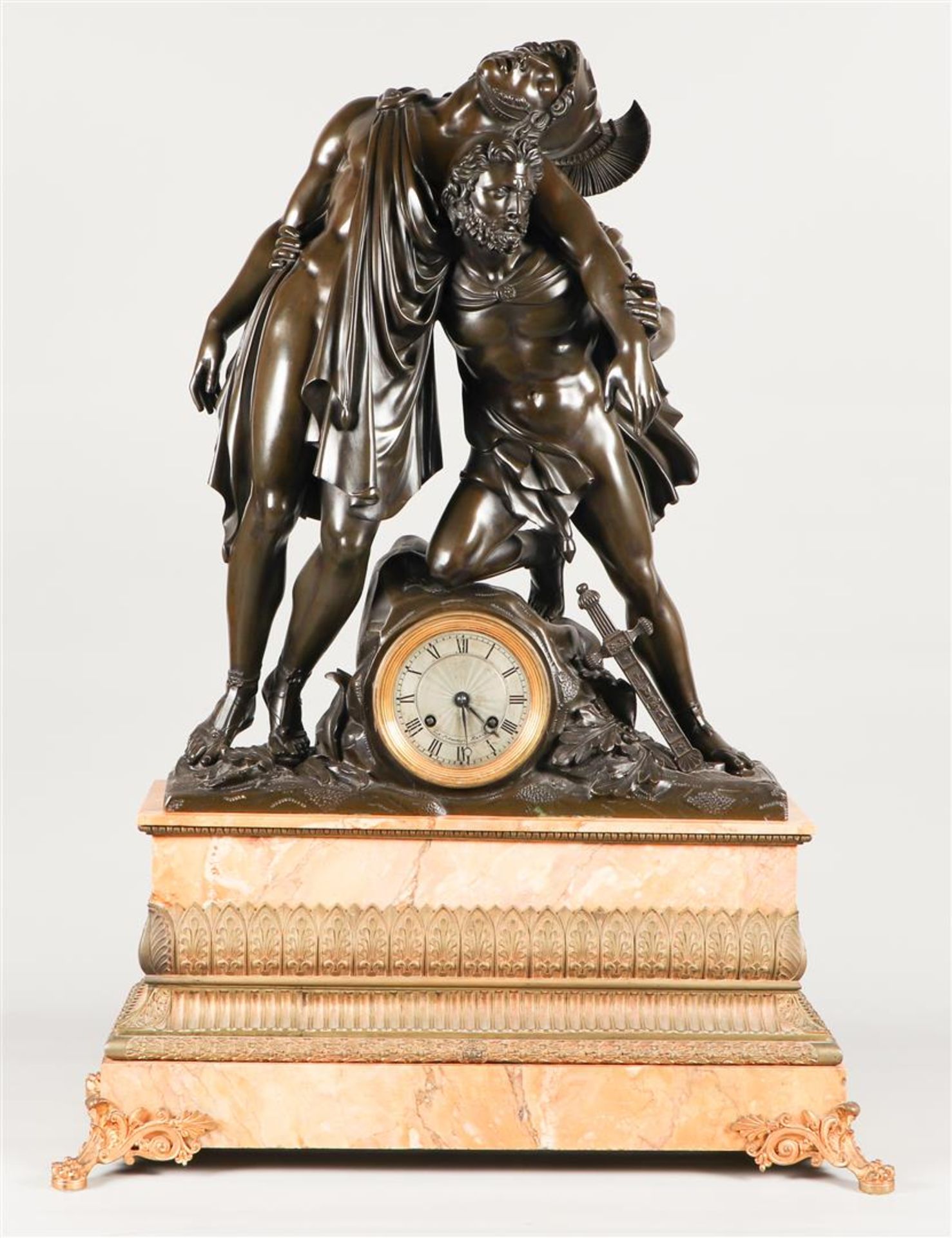 A monumental "Charles X" mantel clock on fire-gilt claw feet and with palm leaf banding. The  large 