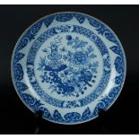 A porcelain deep dish with floral decor, with cachepot on a garden table decor. China, Yongzheng.