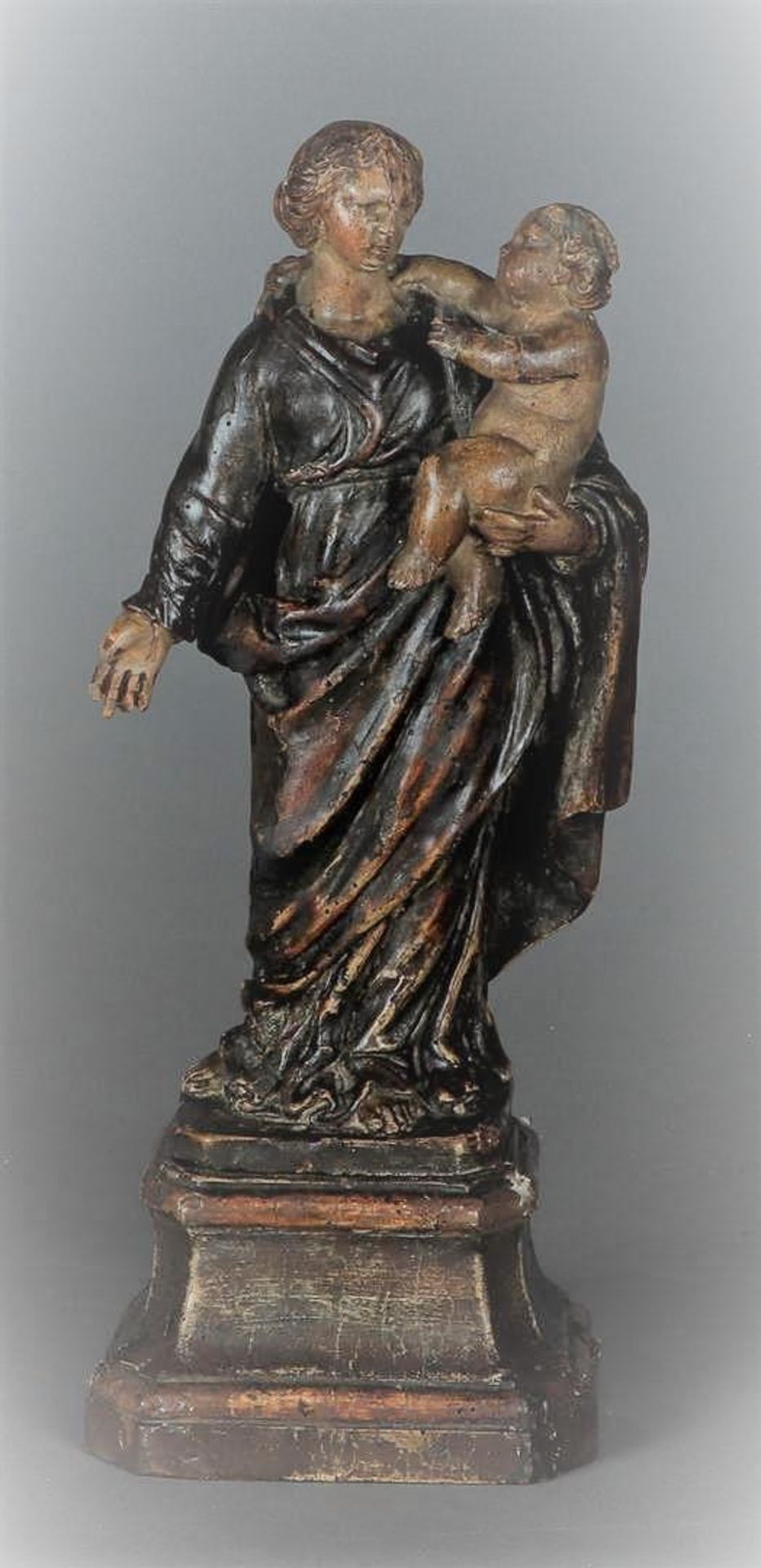 A wooden polychrome statue, Madonna with child. Possibly Antwerp 17th/18th century.
