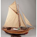 A large very detailed model of a gaff rigged sailing yacht. Approx. 1900.