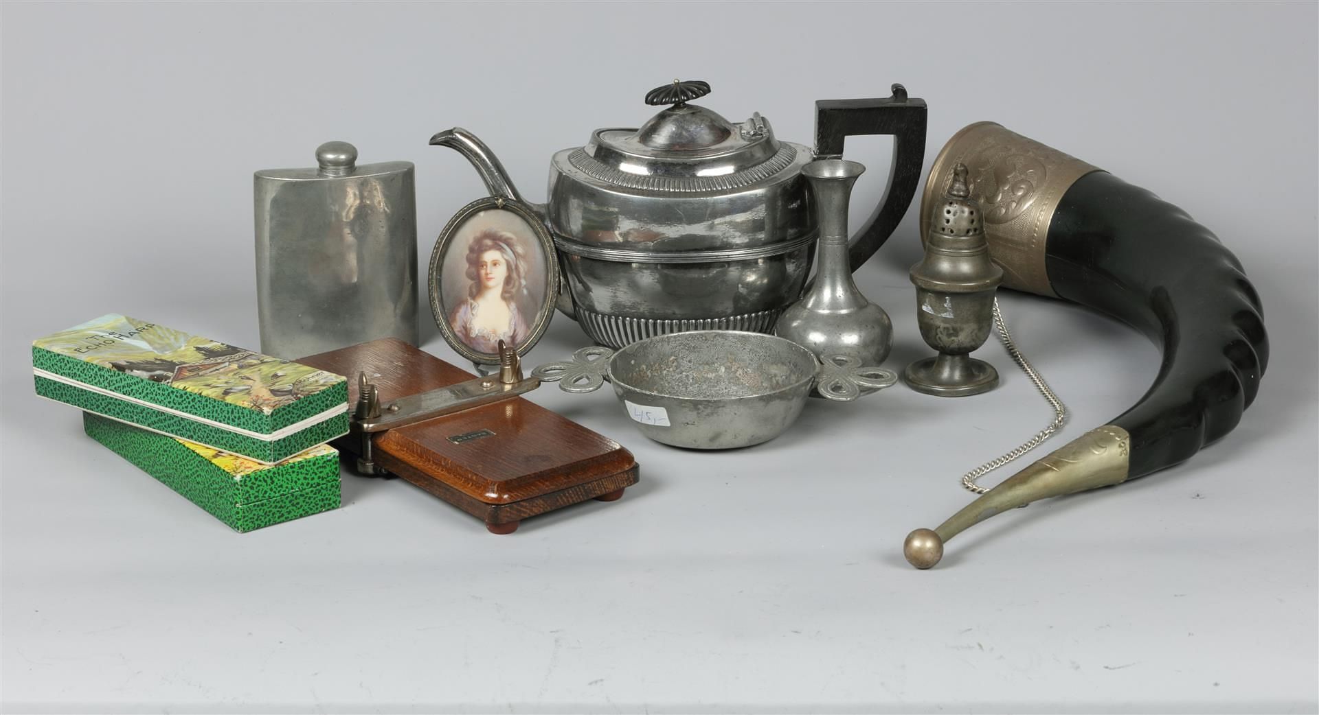 A lot miscellaneous items, including a silver-plated teapot, and two harmonicas.