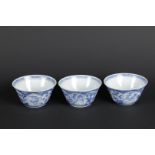 Three porcelain bowls with lotus beds on the outside, with duck and goose decor and with butterfly d