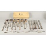 A six-piece silver plated cutlery set consisting of knives, forks, spoons, serving forks and cake se