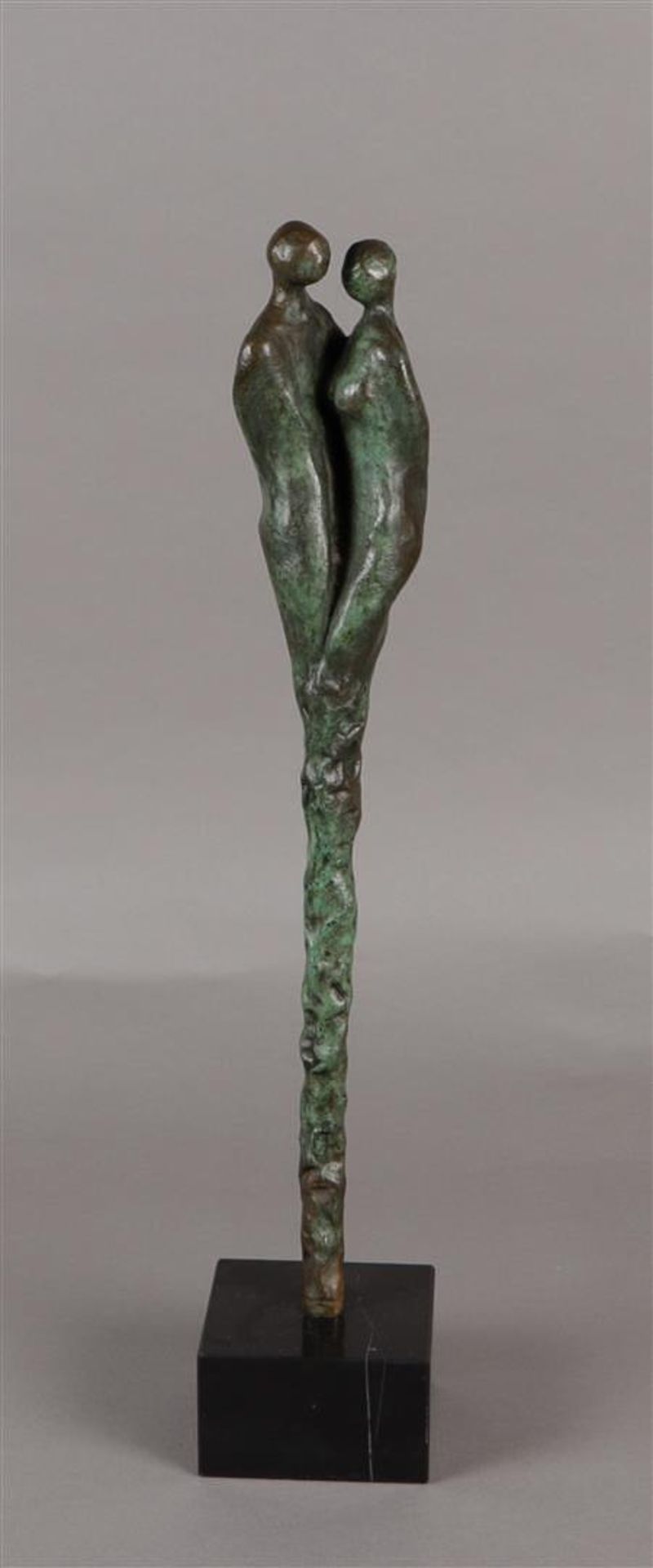 Elly de Clou (born Zoetermeer, 1953), Man and woman, bronze on honed marble base.