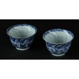 Two porcelain bowls with sloping relief decoration with rich floral decoration. Marked with lotus fl