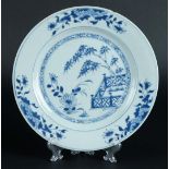A porcelain plate with floral decor. China, Yongzheng.