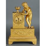 A bronze fire-gilt mantel clock with crab advertisement, France, ca. 1820/30. 1st Empire.