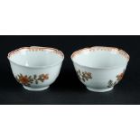 Two porcelain bowls (with cherry blossom relief on the outer rim) with rich floral decoration, the i