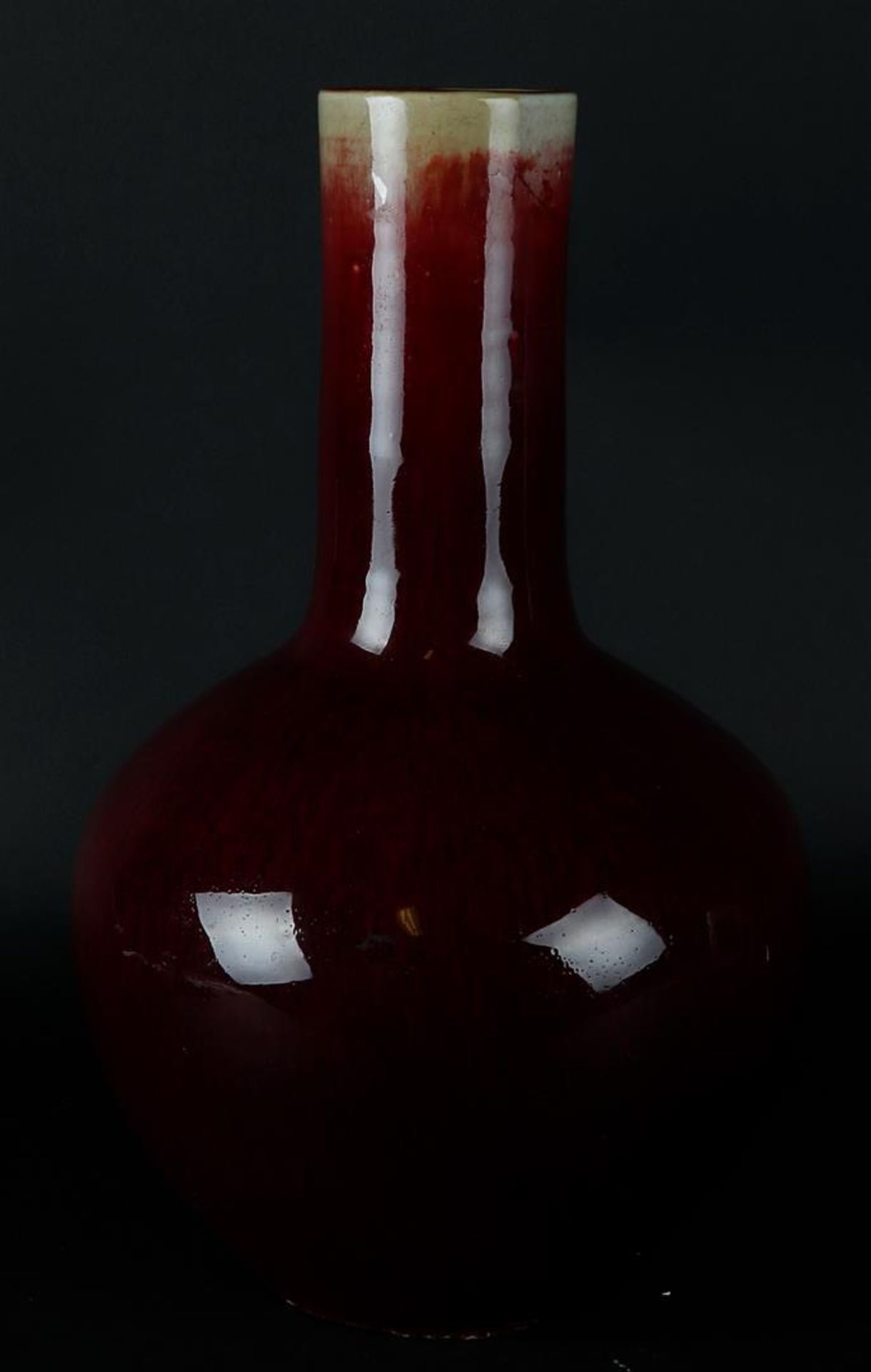 A large porcelain Sang de Boeuf vase, used model. China, 19th century.