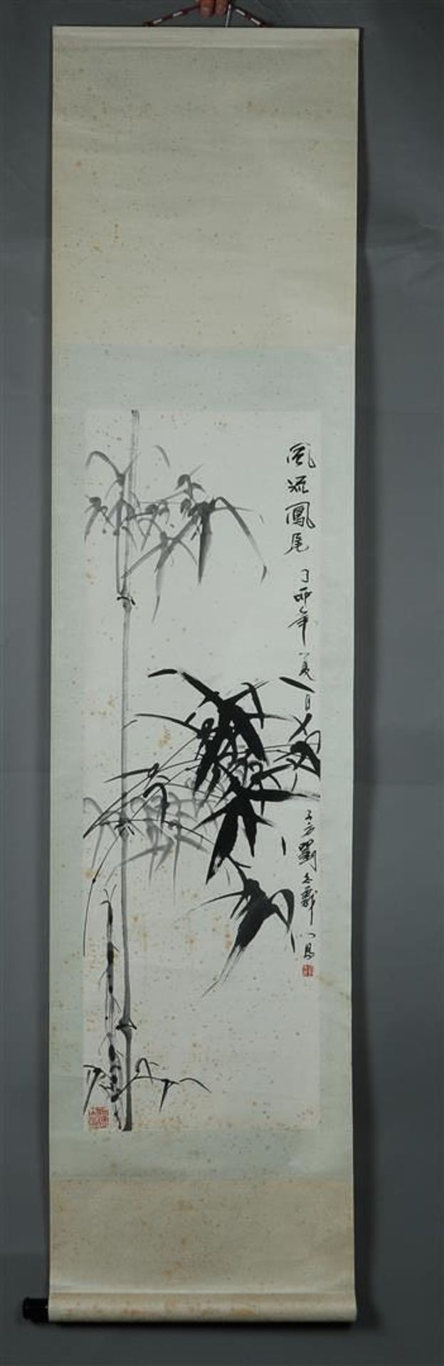 A Chinese scroll drawing depicting reeds on the waterfront. With signature and Chinese characters.