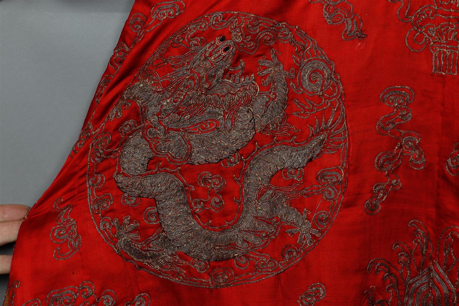 A 19th century embroidered silk cloak, decorated with dragons and Chinese characters. - Image 3 of 3