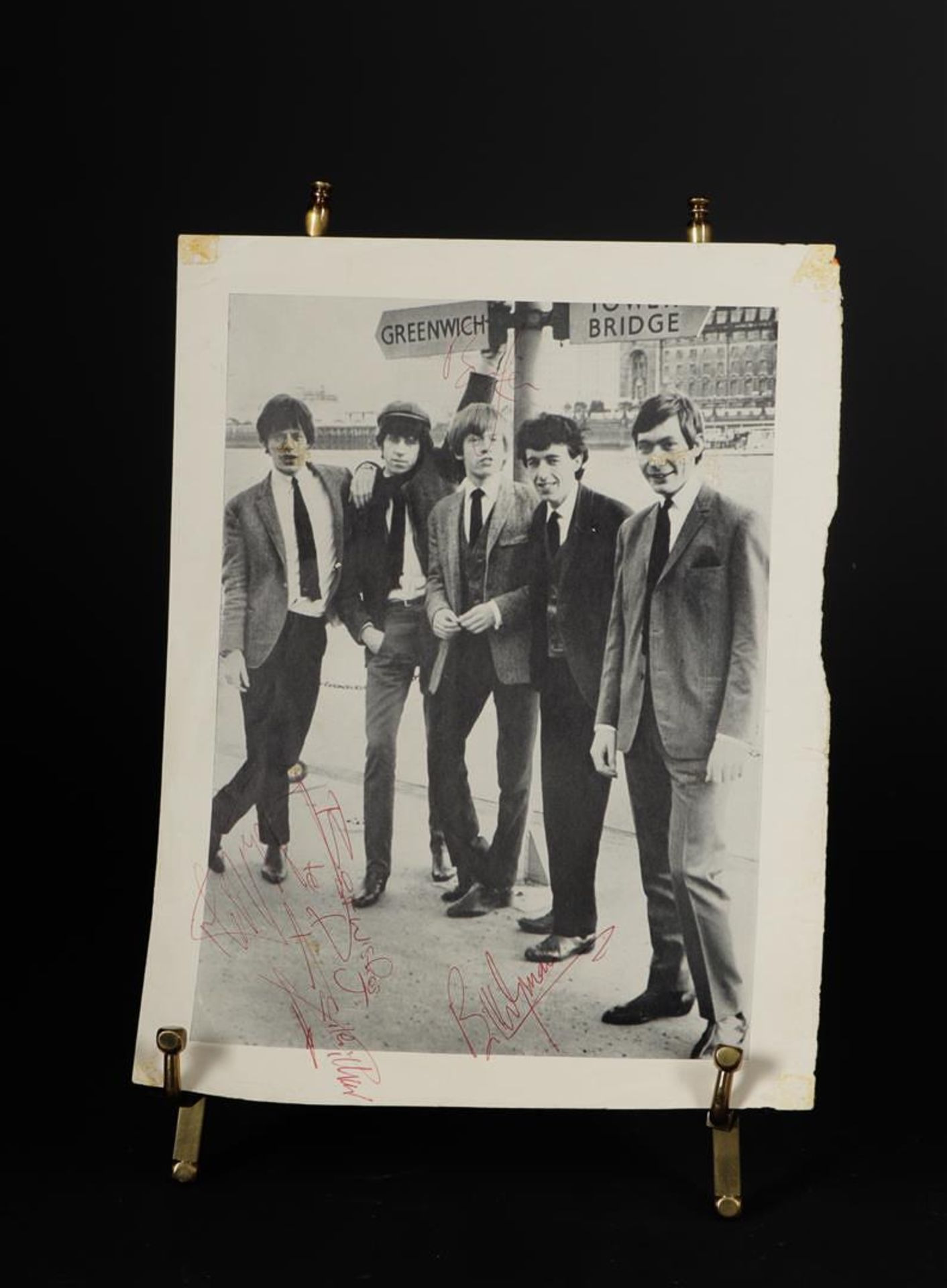 A photo from a program booklet signed by The Rolling Stones.Provenance: David Brook's estate. David 