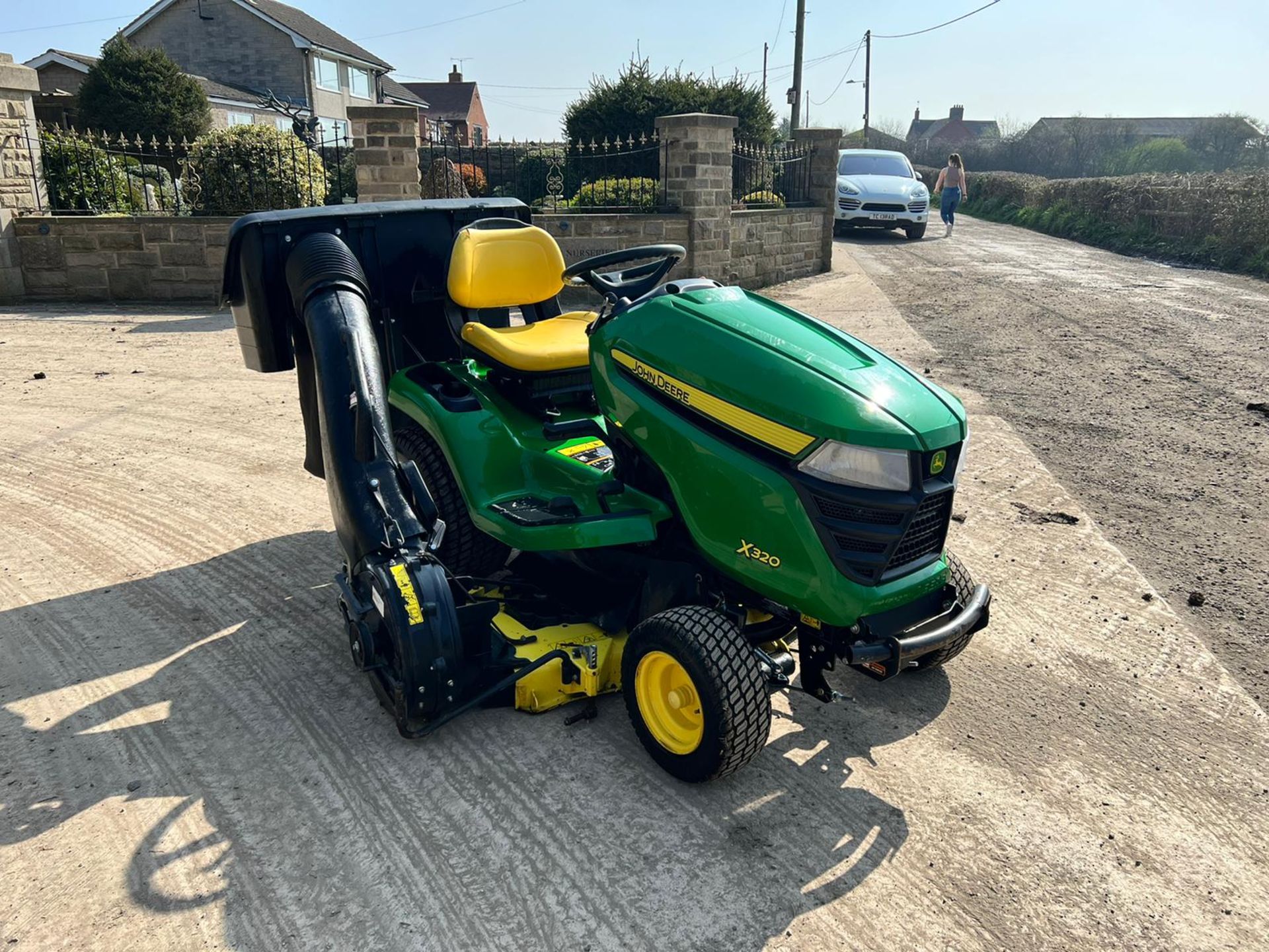 2015 John Deere X320 Ride On Mower With Rear Collector, Runs Drives And Cuts, Showing A Low 213 Hrs