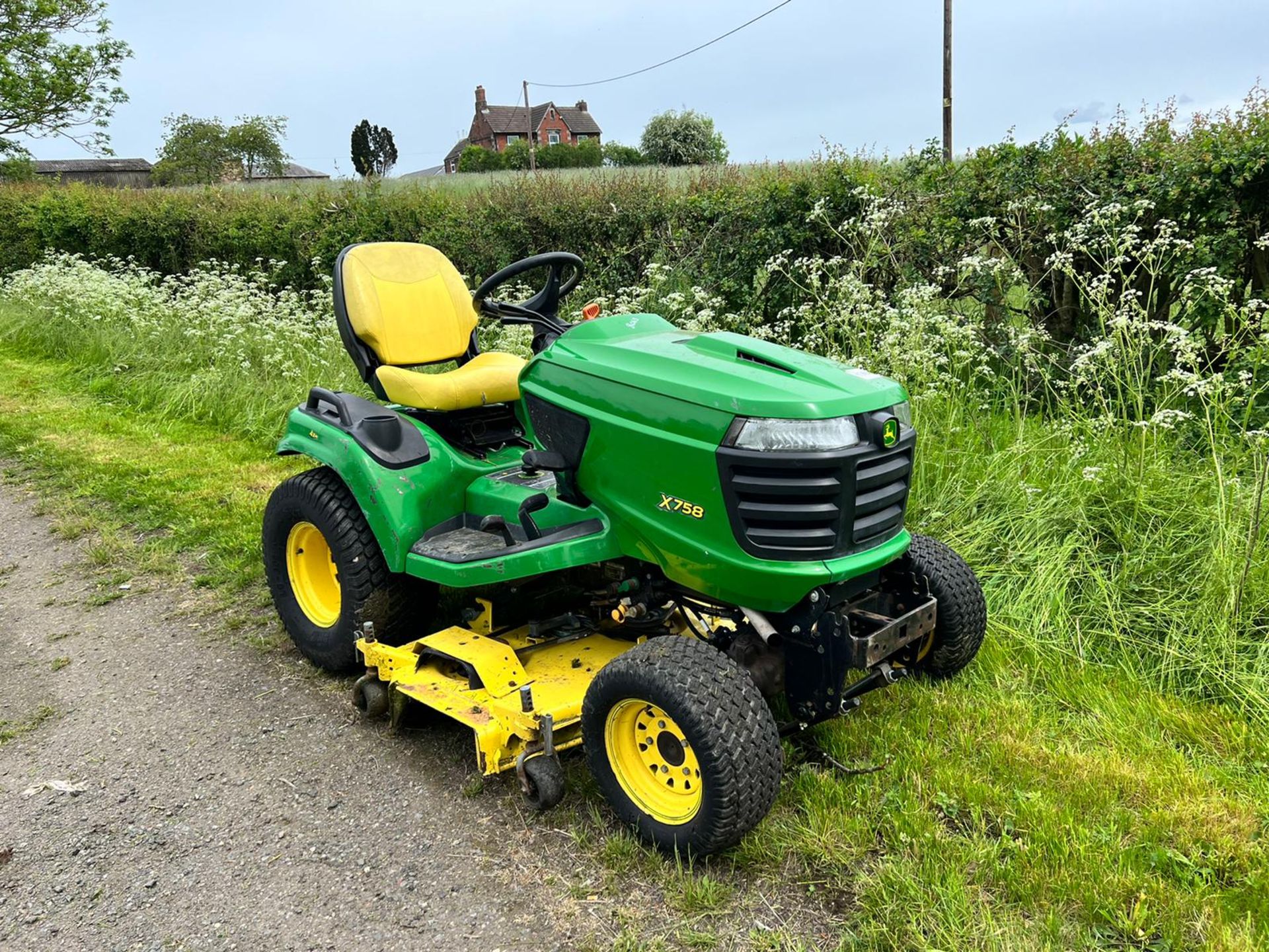 2013 John Deere X758 24HP 4WD Ride On Mower, Runs Drives And Cuts, Showing A Low 950 Hours!