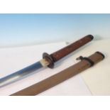 A WWII Officer's Katana by Kanemitsu, star stamped tang and dated 1944