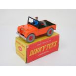 A rare boxed Dinky Toys No.340 orange and green Land Rover with plastic hubs