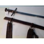 A very fine Sudanese Sword, Kaskara in tooled leather scabbard